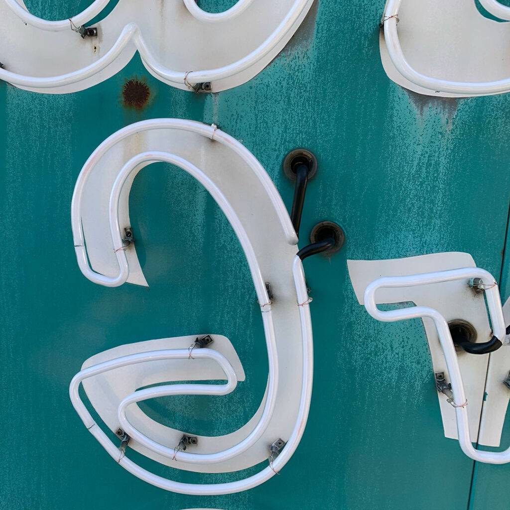 Neon road garden inn motel sign during restoration