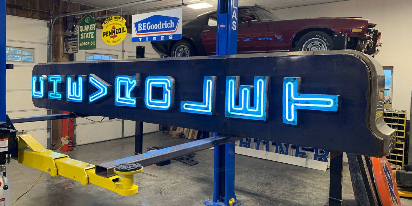 Neon road chevrolet vertical sign