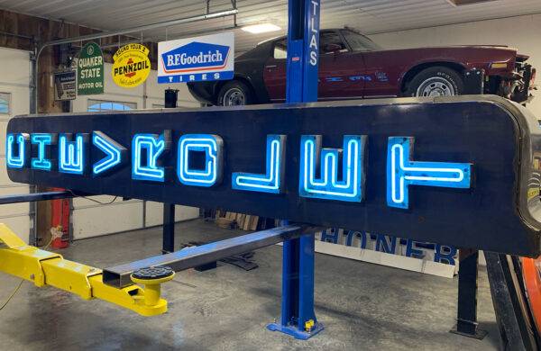 Neon road chevrolet vertical sign