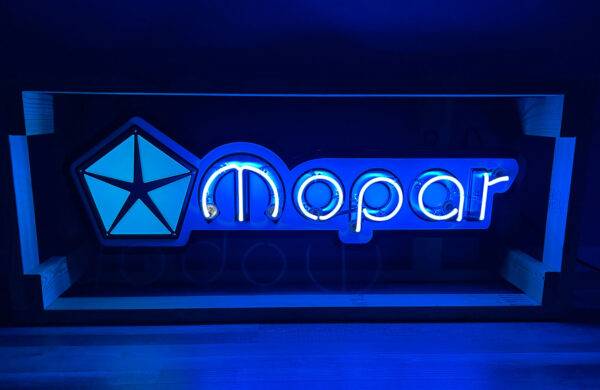 Neon road blue mopar sign lit on