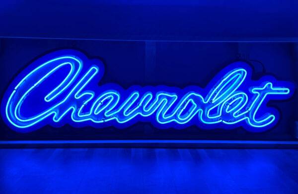 Neon road script chevrolet sign