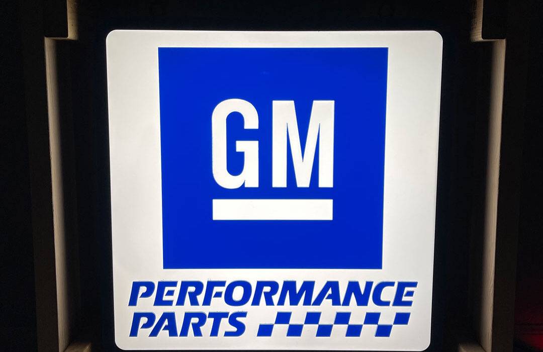 Neon road genuine chevrolet parts round sign