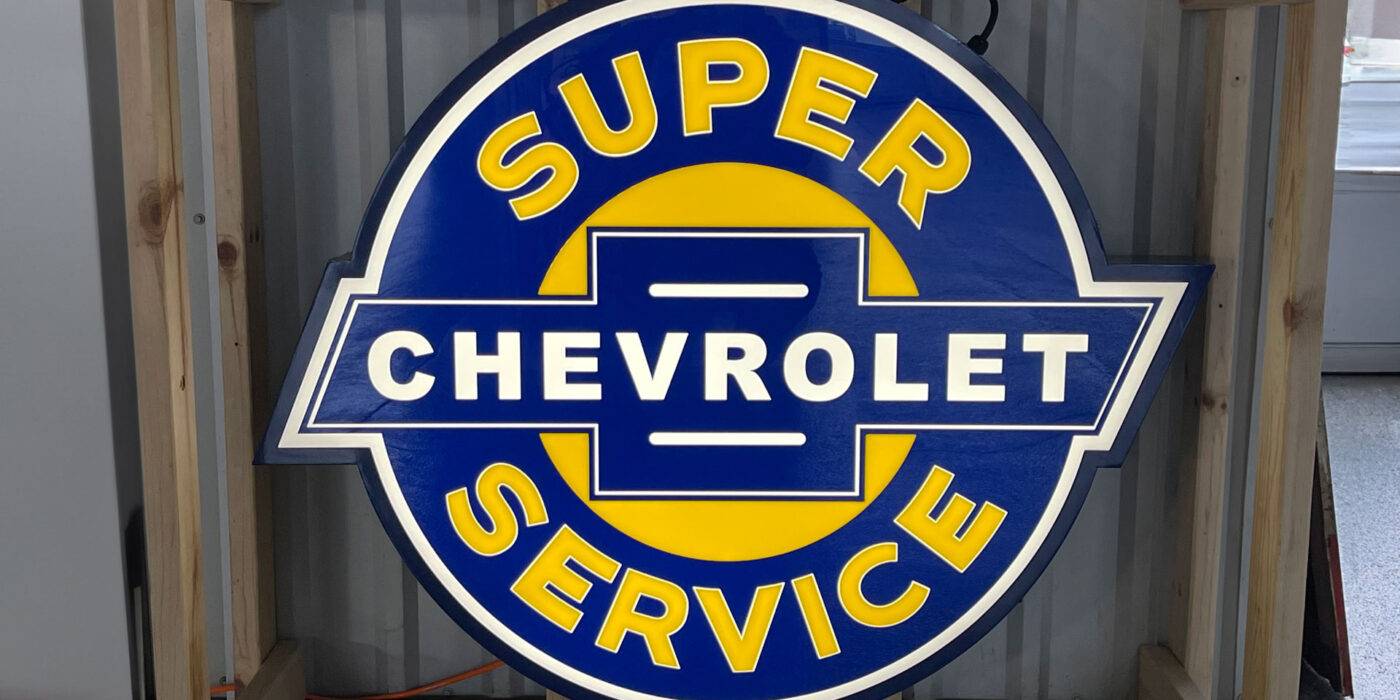 Neon road chevrolet super service round sign