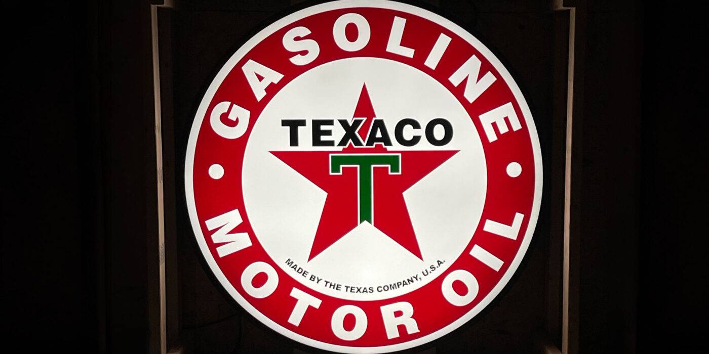 Neon road texaco motor oil round sign